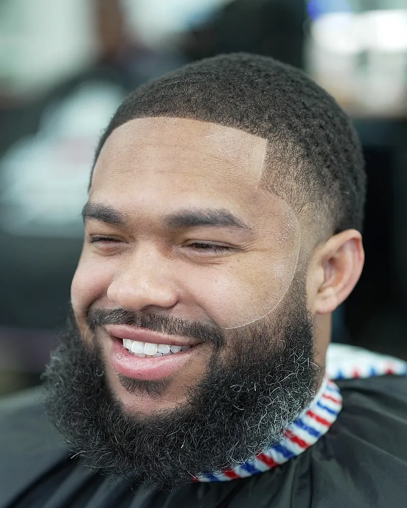 A client with a full sculpted beard